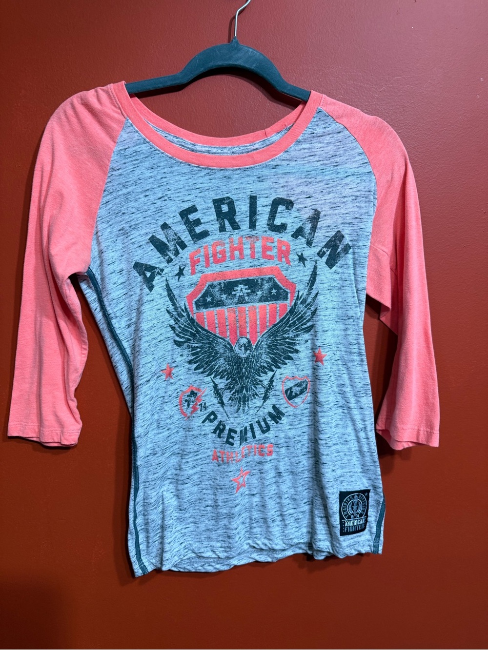 American Fighter Women’s Raglan Tee in Coral and Heather Gray